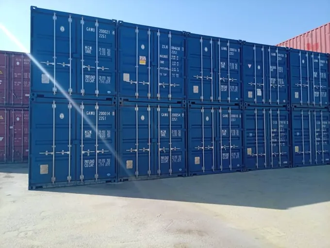 Stacked shipping containers in the terminal yard